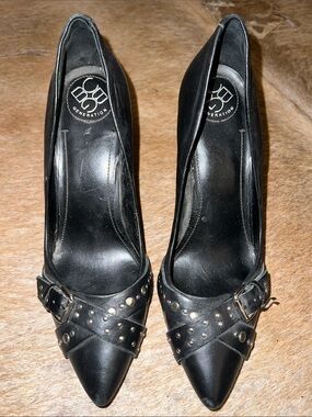 BCBGeneration Black Pointed-Toe Pumps with Studded Crisscross Straps